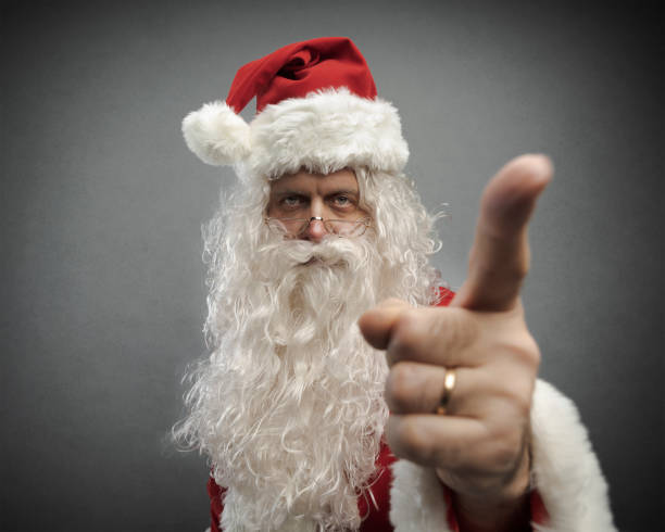 istock Disappointed Santa pointing his finger at you 1080273698