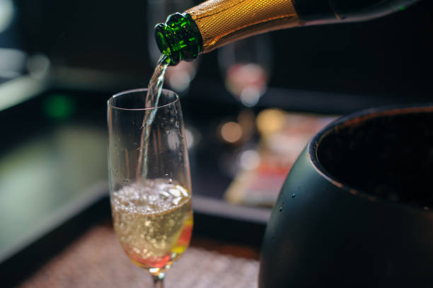istock Pouring champagne for toast 1080281240