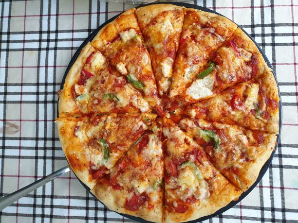 Homemade Pizza with fluffy crust served during family gathering