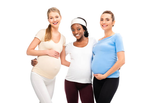 istock three pregnant women standing and hugging isolated on white 1080289580