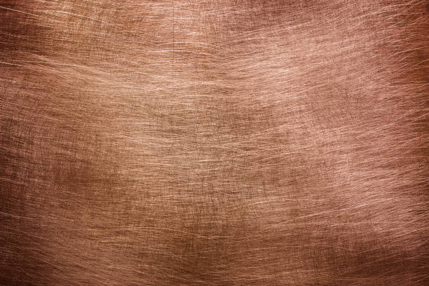 istock Copper background brushed, texture of old metal close-up 1080290388