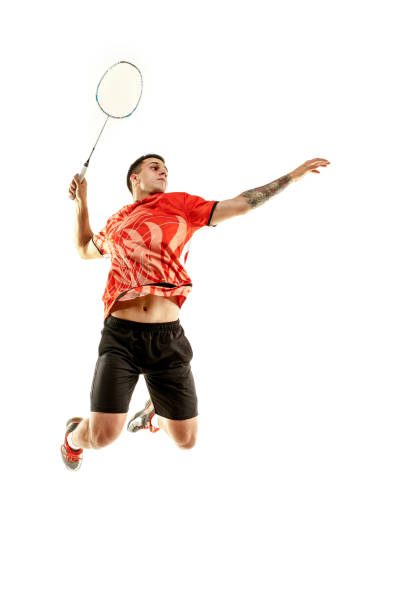 istock Young male badminton player over white background 1080292034