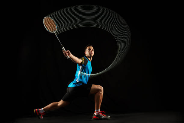 istock Young male badminton player over balck background 1080292112