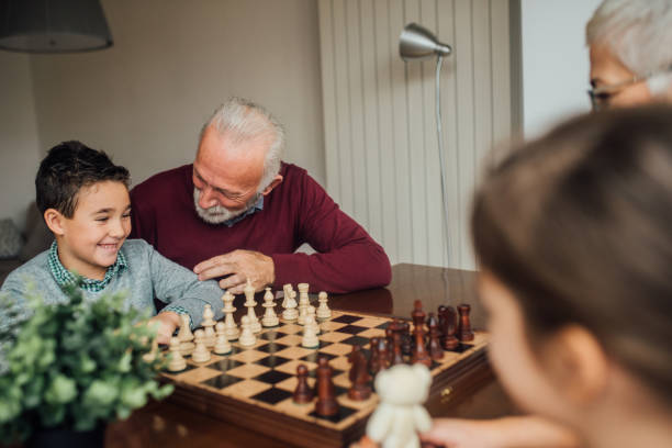 istock Happy family playing chess 1080295212