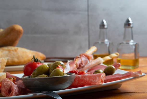 istock plate of antipasto on a wooden table 1080295796