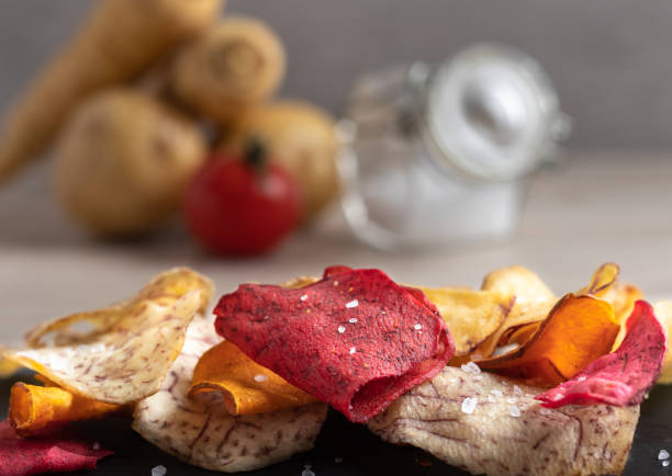 istock vegetable crisps with salt seasoning 1080296184