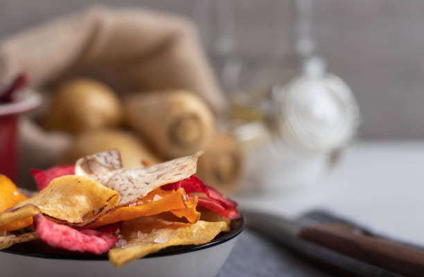 istock vegetable crisps with salt seasoning 1080296240