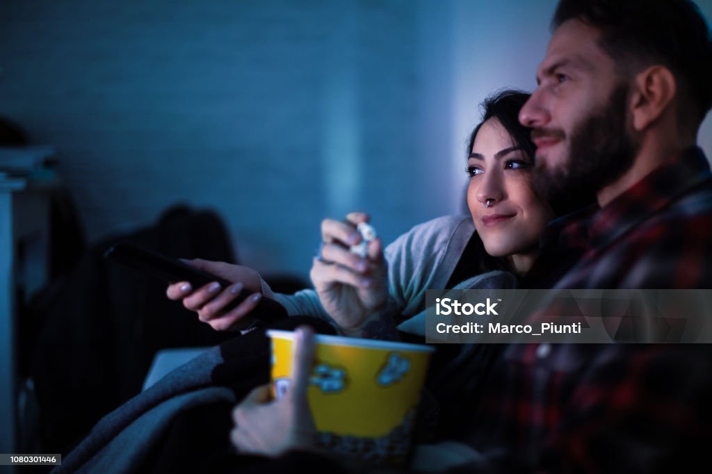 Home movie tonight Couple - Relationship Stock Photo