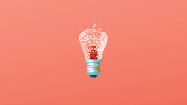 istock Glass textured strawberry lightbulb idea on creative Leaving Coral background. 1080301494