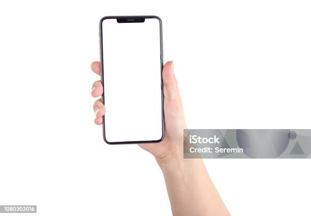 Smartphone With A Blank White Screen New Popular Smartphone In Hand On White Background Stock Photo - Download Image Now