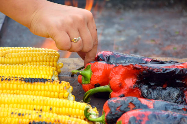 sweet corn and paprika on grill
