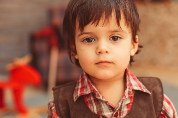 istock sweet nice toddler looking at camera 1080309488
