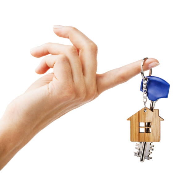 istock House keys on the index finger isolated on white background 1080315532