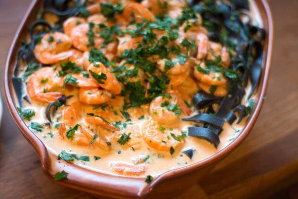 istock Black Spaghetti With Fresh Shrimps 1080322288