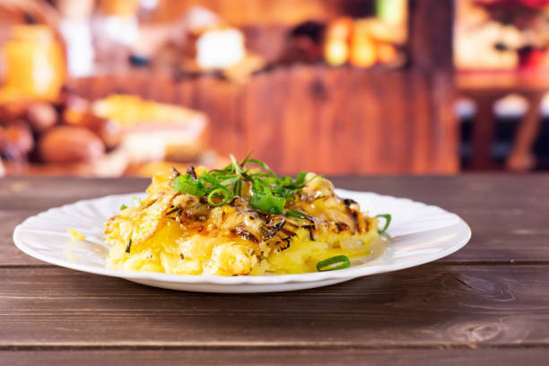 istock Recipe step by step baked potatoes with onion with rustic kitchen 1080322756