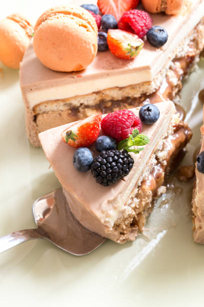 istock home-made cake with macaron and fresh fruit, berries on a light background 1080323664