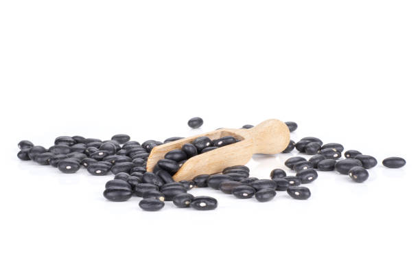 istock Raw black turtle beans isolated on white 1080327330