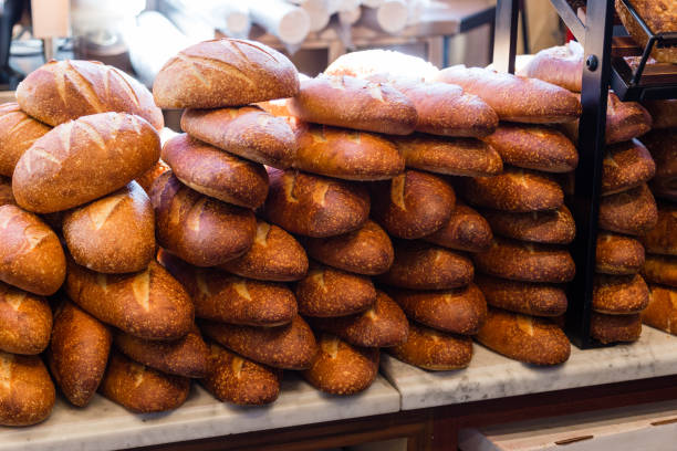 istock Fresh sourdough bread stacked in a bakery ready to sell and eat 1080328964