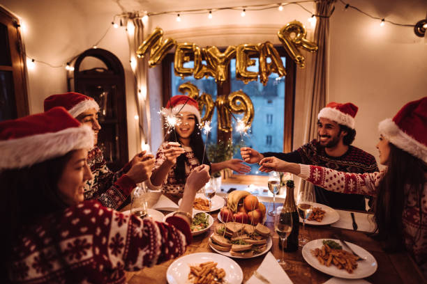 istock people have fun at dinner for christmas 1080329178