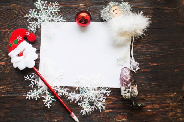 istock christmas card on a wooden background 1080329196
