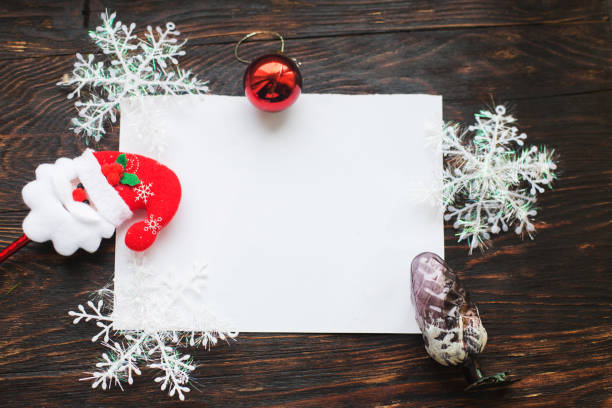 istock christmas card on a wooden background 1080329302