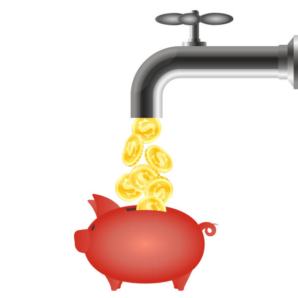 istock From the tap coins fall into the piggy bank 1080335244