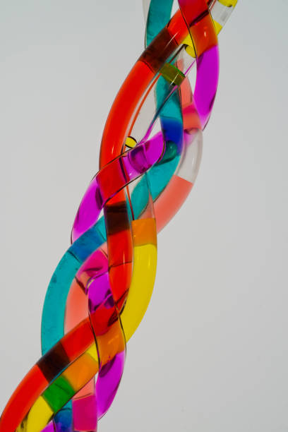 Circle of colored chocolate round candies. Space for text. Top view, flat lay.