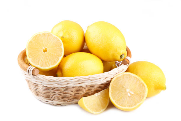 istock Lemon in basket isolated on white background. Tropical fruit. 1080344596
