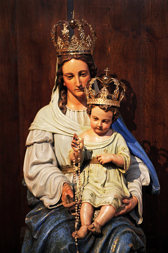 Statues of the Virgin Mary crowned with the Child Jesus and the Rosary