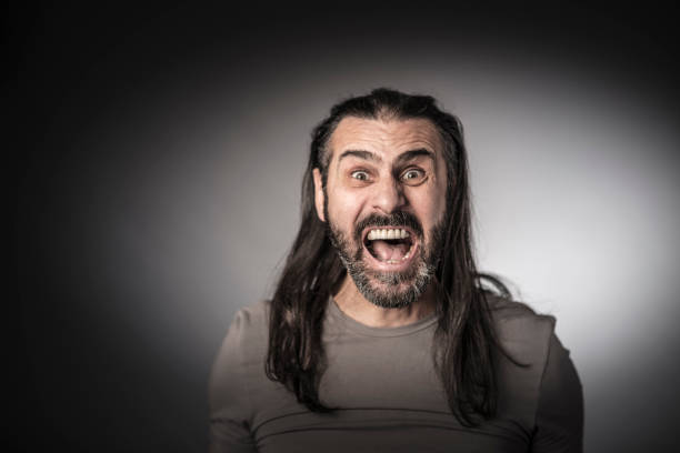 istock stressed long hair man portrait 1080349396