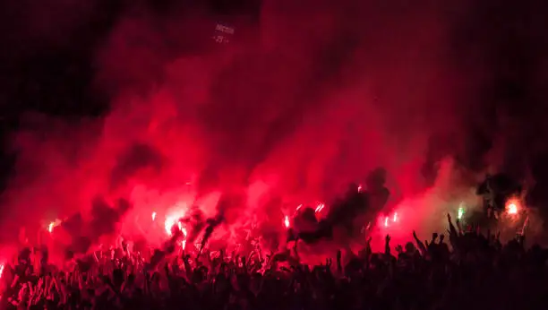 Football fans lit up the lights, flares and smoke bombs