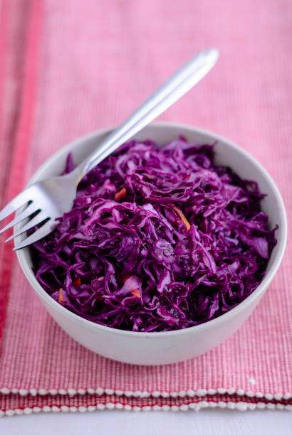 istock Fork on bowl with purple sauerkraut 1080359056