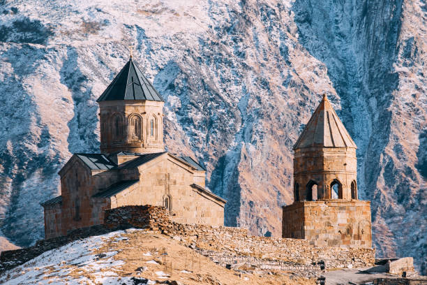 istock Stepantsminda, Georgia. Famous Gergeti Trinity Tsminda Sameba Church In Early Winter 1080359248