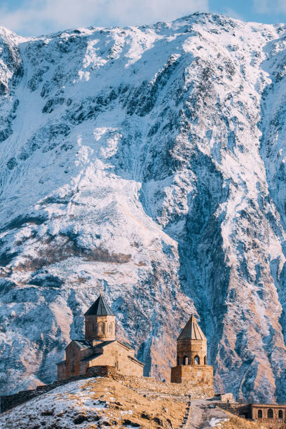 istock Stepantsminda, Georgia. Famous Gergeti Trinity Tsminda Sameba Church In Early Winter 1080359300