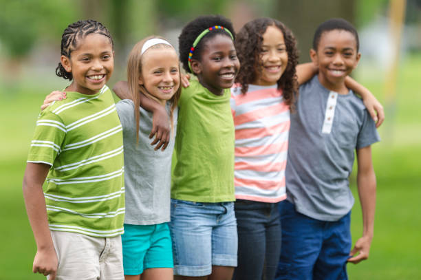 istock Group of children in a park 1080364528