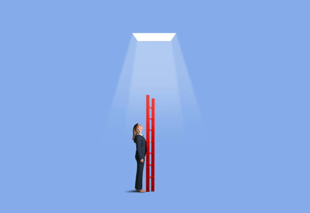 istock Businessman Standing With Ladder That Is Too Short 1080368556