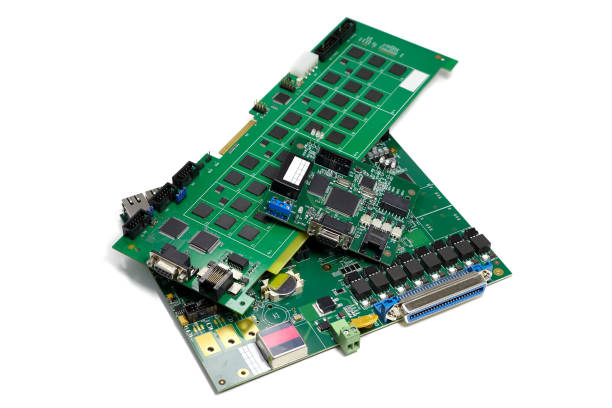 istock Set of electronic printed circuit boards with microchips and other components, angled view, isolated on white 1080372158