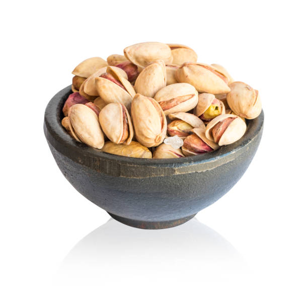 istock Pistachios in a Round Bowl Isolated 1080375838
