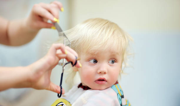 Toddler Child Getting His First Haircut Stock Photo - Download Image Now -  Hairdresser, Hairstyle, Cutting Hair - iStock
