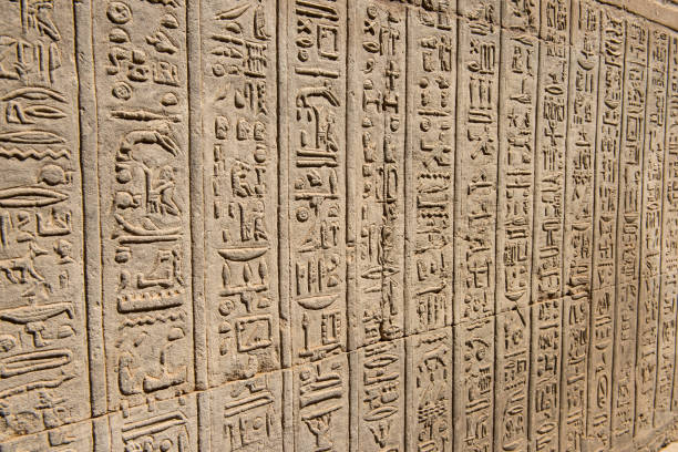 istock Hieroglyphic carvings on an ancient egyptian temple wall 1080383418