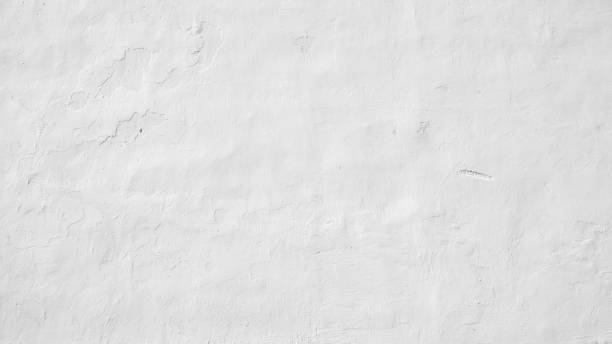 istock White wall of the house close up. 1080386708
