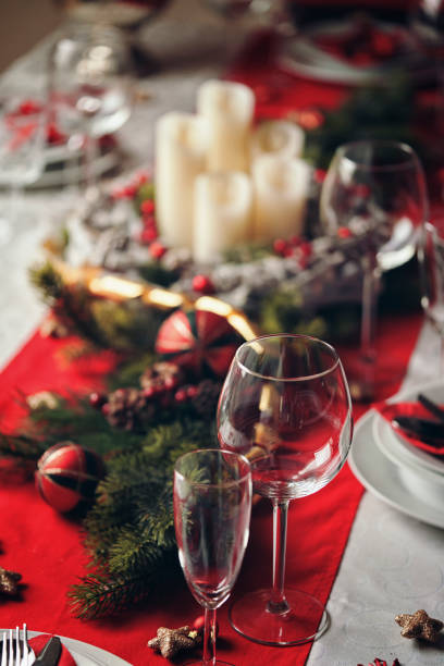 istock Decorated Table for Christmas Dinner with Candles and Christmas Ornaments 1080387492