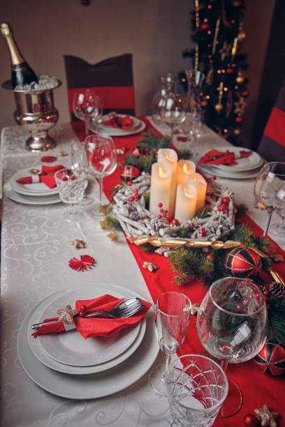 istock Decorated Table for Christmas Dinner with Candles and Christmas Ornaments 1080387500