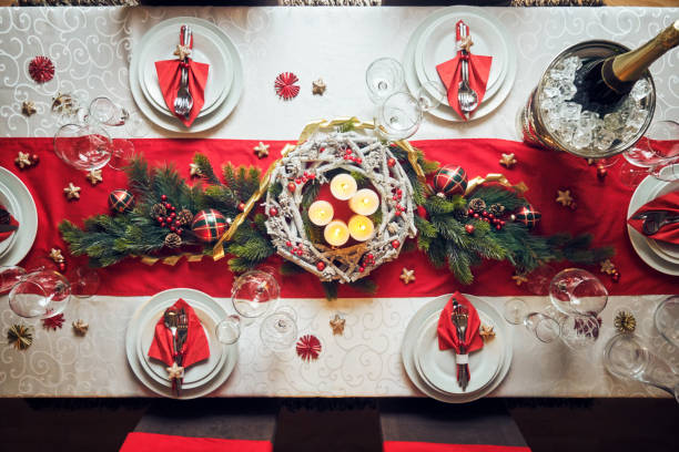istock Decorated Table for Christmas Dinner with Candles and Christmas Ornaments 1080387548