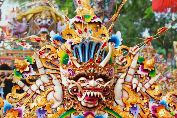 Traditional balinese temple old decoration for religious holiday festival and ceremony - carved hindu protective spirit Bhoma. Art, unique culture, tradition of Bali island and Indonesian people.