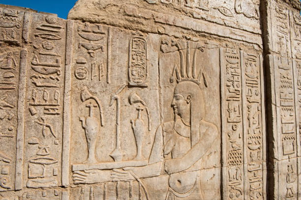 istock Hieroglyphic carvings on an ancient egyptian temple wall 1080392110