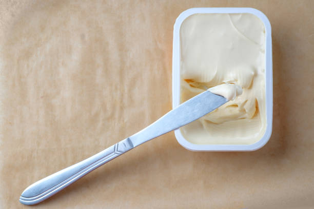 istock Sliced bread toast cream cheese, top view 1080392412