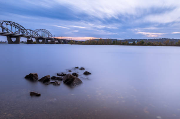 istock The sky and the river on a long exposure. Cityscape with a river. 1080395710