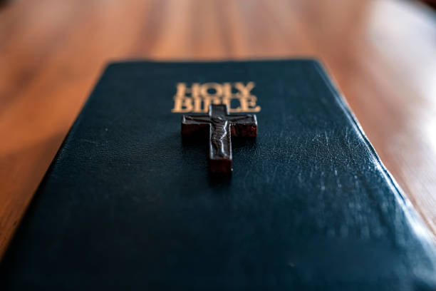 istock Holy Book on Wooden Table 1080395820