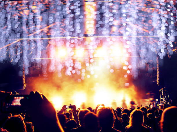 istock Concert crowd inside a large venue 1080403450